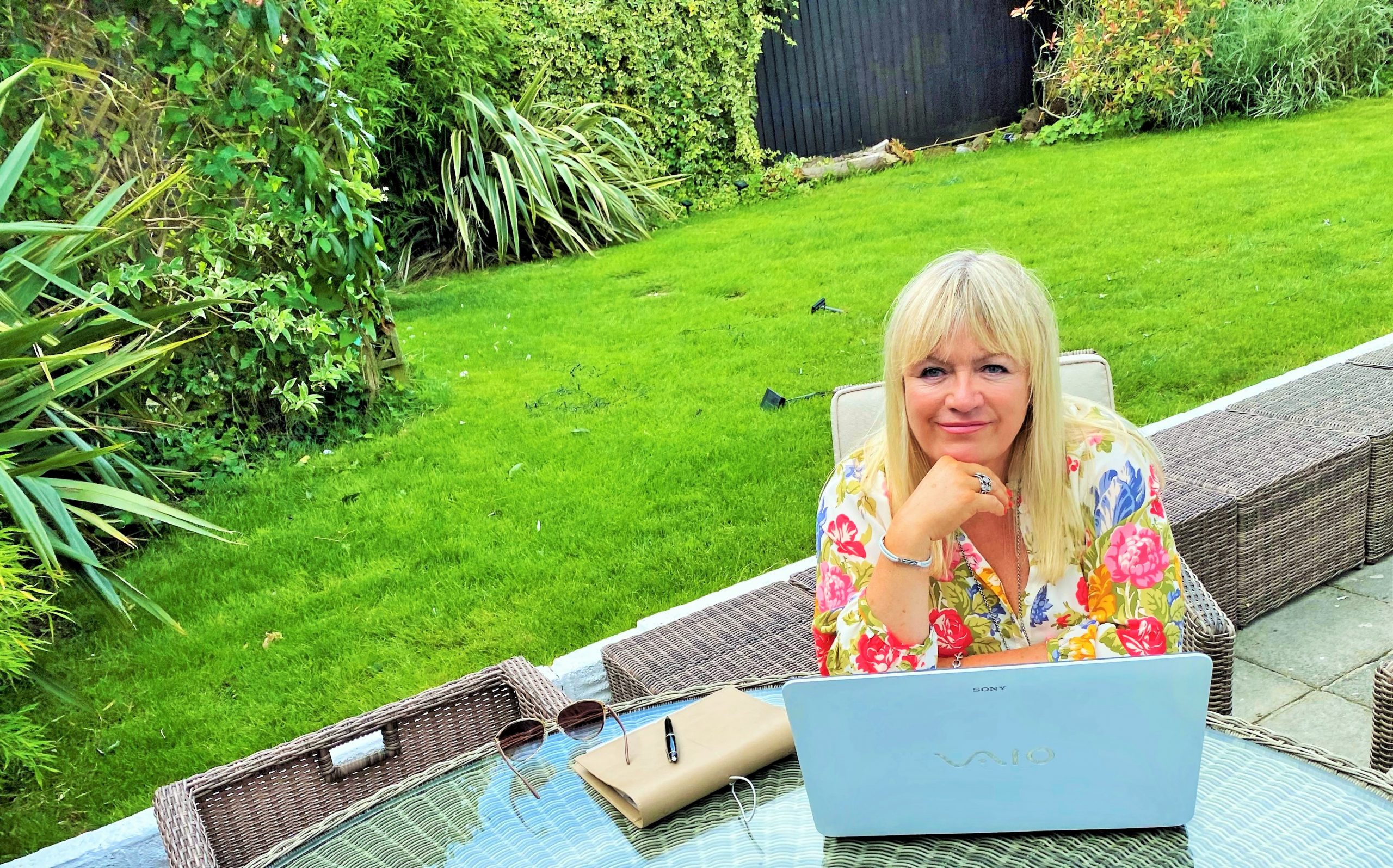 Blog - Beverley Chilcott Blog - Bev writing in garden